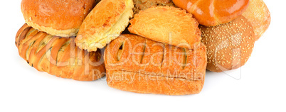 Bread and bakery products isolated on white background. Wide pho