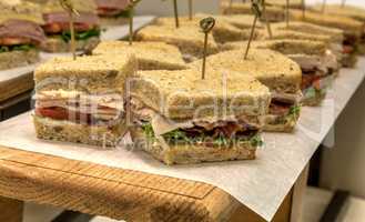 Turkey club sandwich with bacon with the bread crust cut off