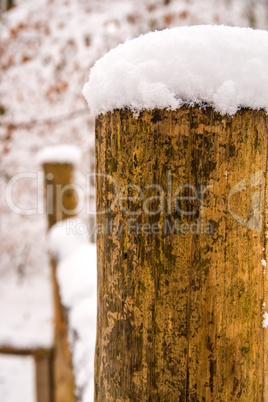 snow hat on a fence mast snow hat on a fence mast
