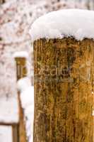 snow hat on a fence mast