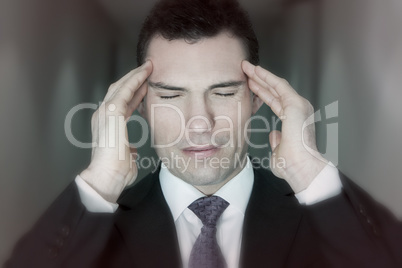 Business Man Suffering from Stress Migraine Headache