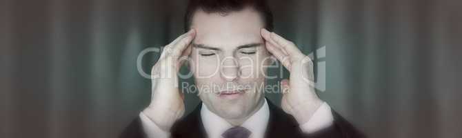 Business Man Suffering from Stress Migraine Headache
