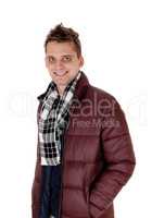 Portrait of a young smiling man in burgundy jacket