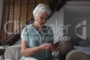 Senior woman using mobile phone