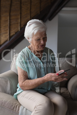 Senior woman using mobile phone