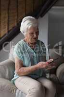 Senior woman using mobile phone