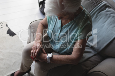 Senior woman checking time