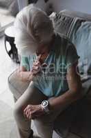 Senior woman checking time