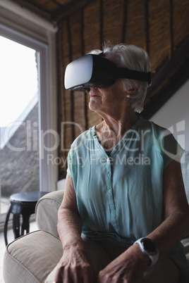 Senior woman using virtual reality headset