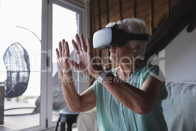 Senior woman using virtual reality headset Senior woman using virtual reality headset
