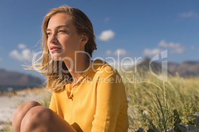 Young woman relaxing on the beach