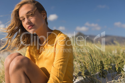 Young woman relaxing on the beach