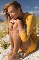 Young woman relaxing on the beach