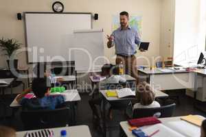 School teacher teaching in a classroom