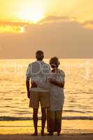 Senior Couple Sunset Tropical Beach