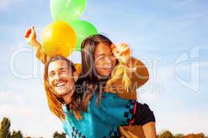 Man and woman with air balloon
