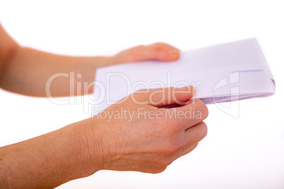 Hands are holding opened letter