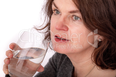 Woman with a glass of water