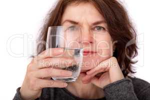 Woman with a glass of water
