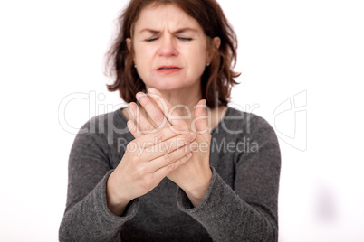 Woman has a pain in her hand