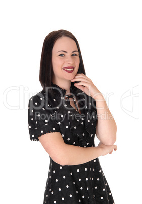 Beautiful smiling woman in a pock dot dress