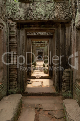 View through stone corridor in ruined temple