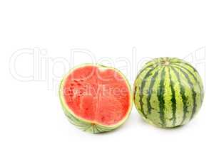 Ripe round watermelon and half berry isolated on white backgroun