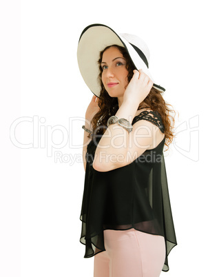 Girl in a white straw hat isolated against white background