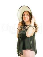 Girl trying on a straw hat