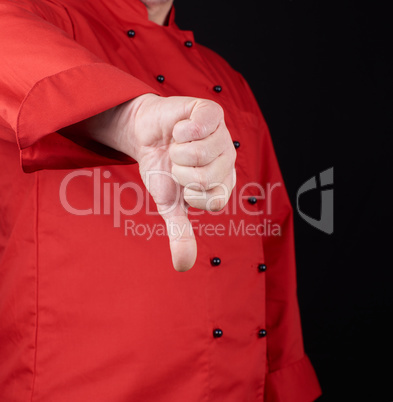 cook in red uniform  shows gesture dislike
