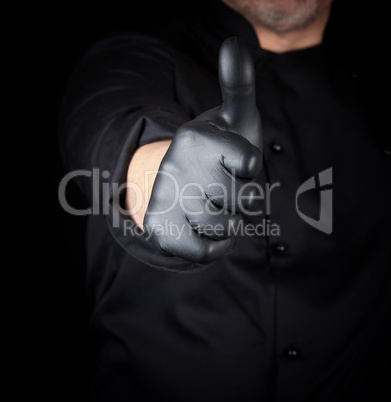 cook in black shows gesture like
