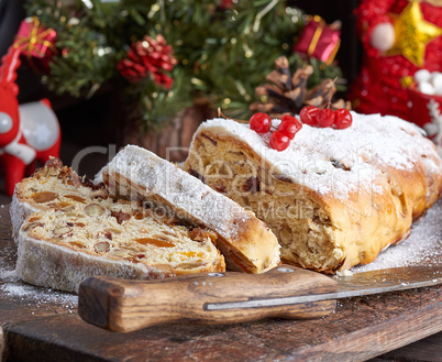 Stollen a traditional European cake with nuts and candied fruit,