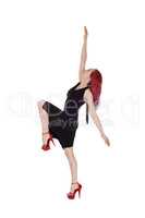 Woman dancing in black dress and red hair