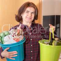 Woman with paper and bottles bucket