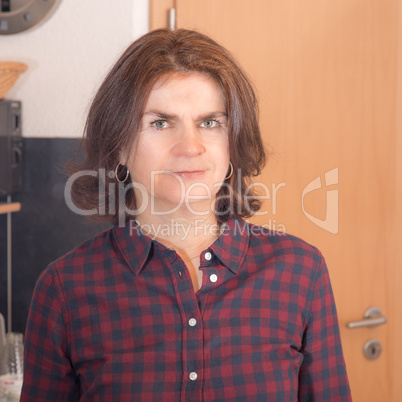 Middle aged woman in home environment