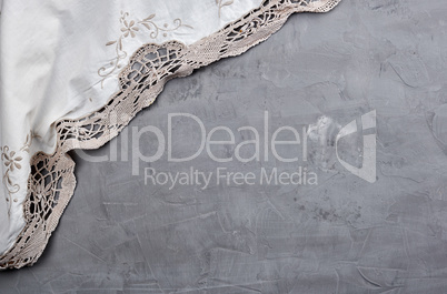 textile kitchen towel on gray cement background