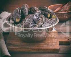 fresh boiled eggplants in an iron bowl