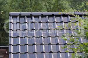 Black roof tiles on a roof