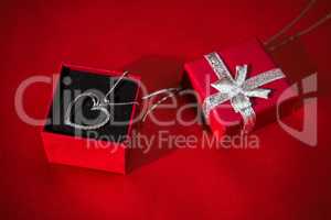 Silver heart pendant in a red gift box