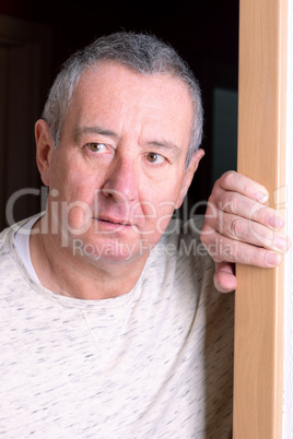 Man is standing in the door