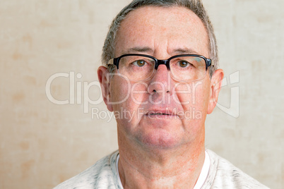 Portrait of a senior man with glasses