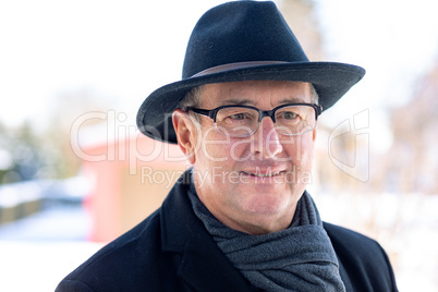 Portrait of a senior with hat