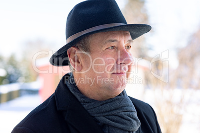 Portrait of a senior with hat