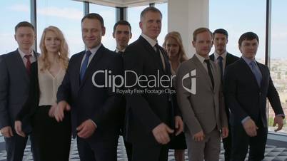 Business co-workers clapping