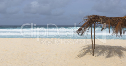 Beach at La Dique island with sun protection, Seychelles