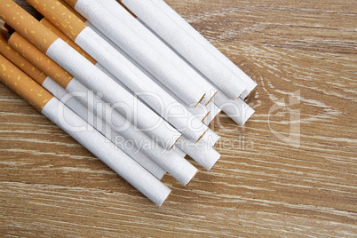 Cigarettes on a wooden background