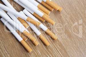 Cigarettes on a wooden background