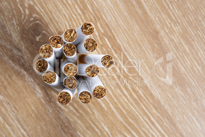 Cigarettes on a wooden background