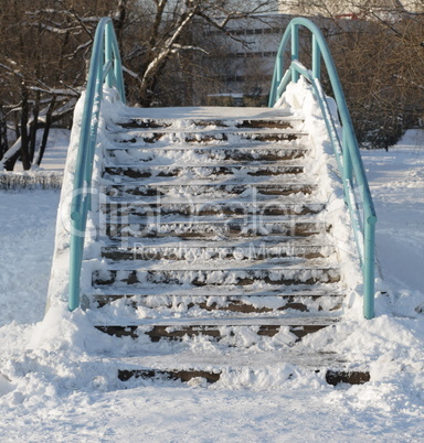 bridge over pond at winter