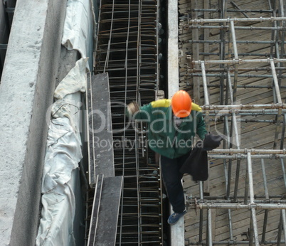 workpeople on ledge